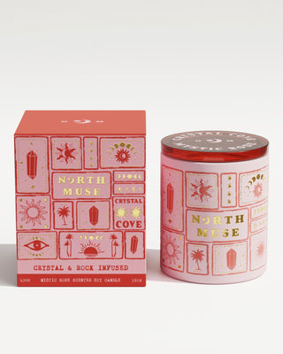 North Muse 'Crystal Cove' candle in a pink jar with matching box, featuring celestial designs and labeled 'Mystic Rose Scented Soy Candle.'"  This alt text is brief and includes essential details, making it suitable for Shopify’s requirements. Let me know if you need any further help!