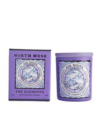 North Muse 'Air Signs' candle in a purple jar with matching box, featuring Gemini, Libra, and Aquarius zodiac signs.